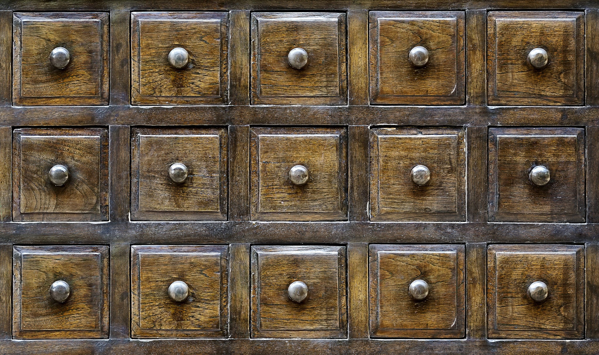 decorative wooden cupboard with small drawers