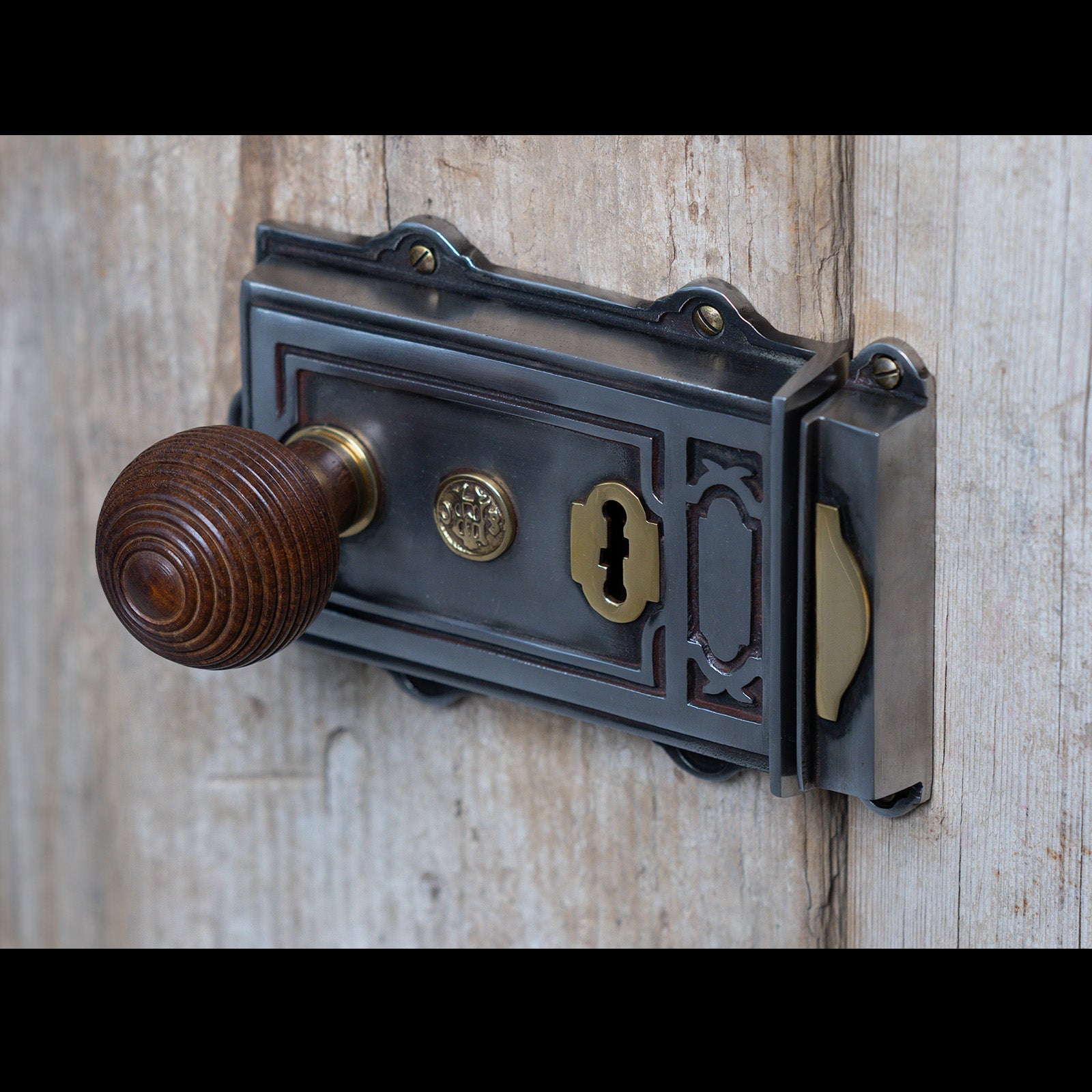 Victorian rim lock with rosewood beehive door knob