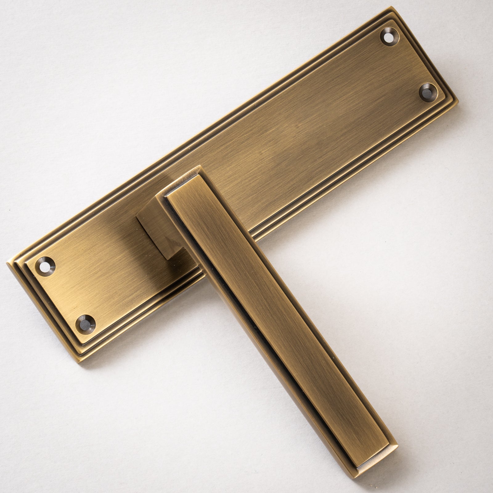 Atlantis Door Handles On Plate Latch Handle in Aged Brass SHOW