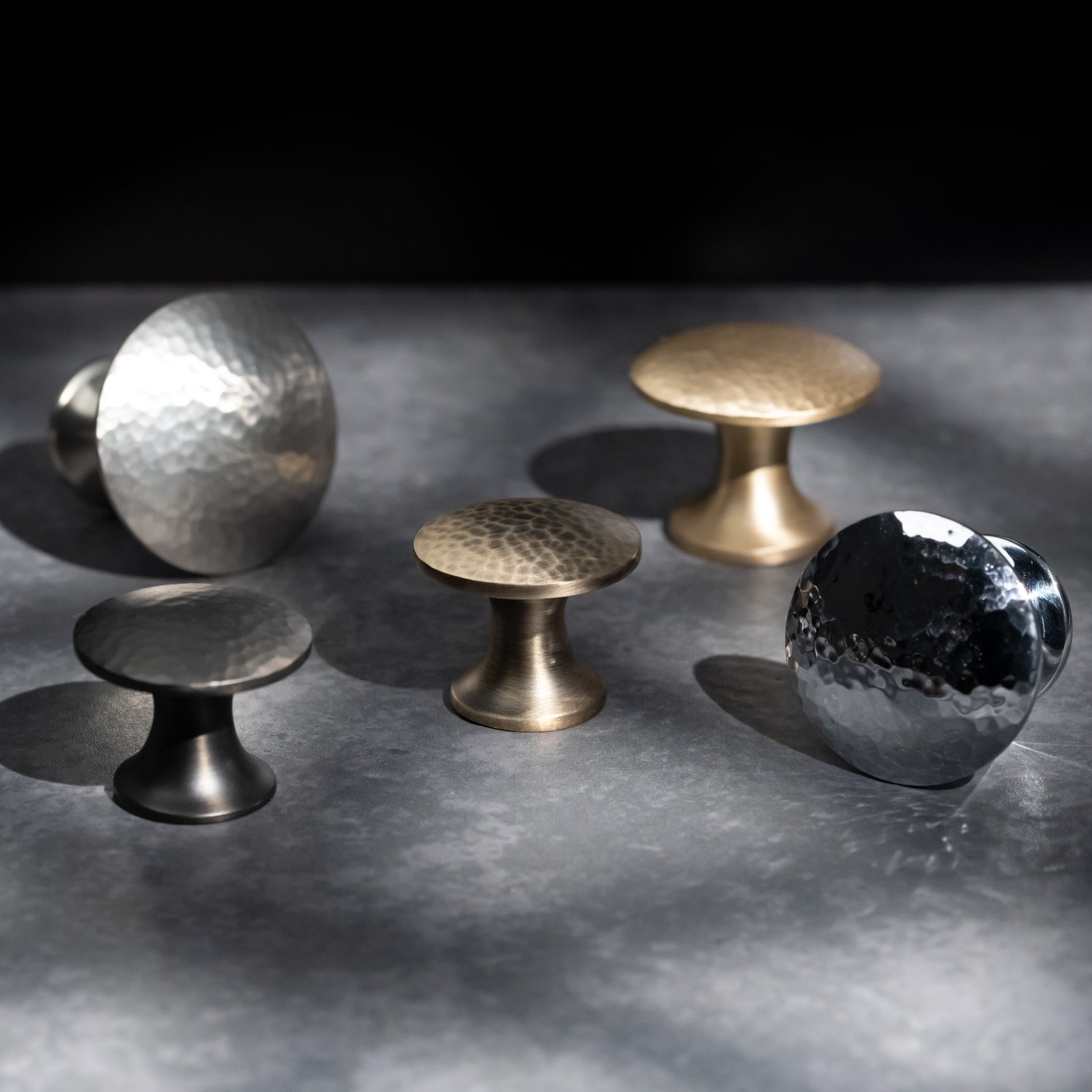 Hammered classic cabinet knob in antique brass finish