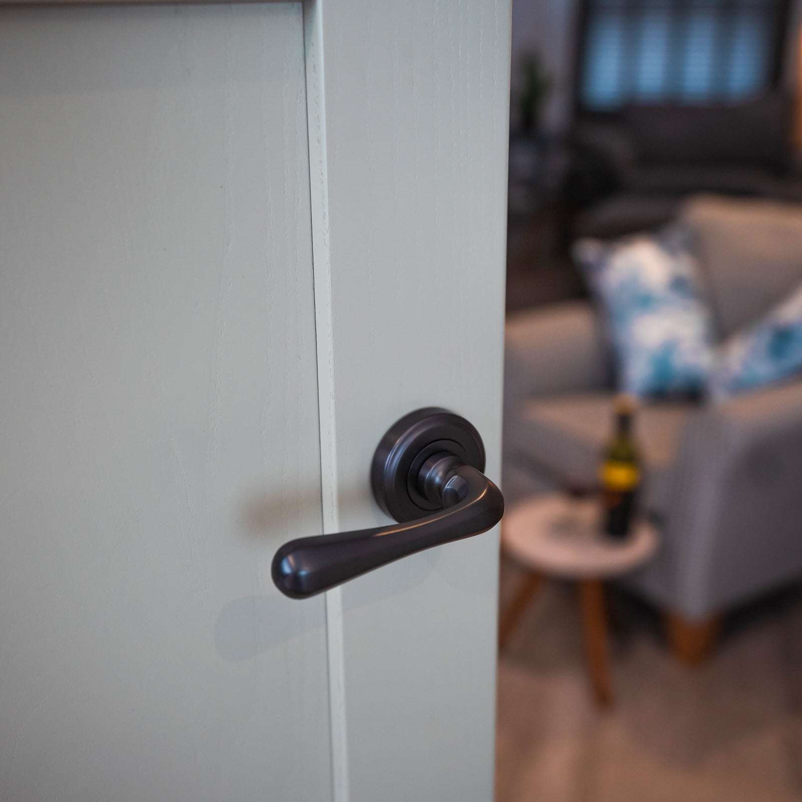 traditional round rose door handle, bronze lever on rose SHOW