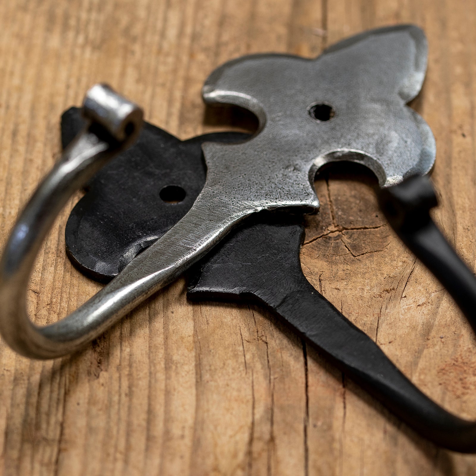 Hand Forged fluer de lis coat hooks in black and pewter SHOW