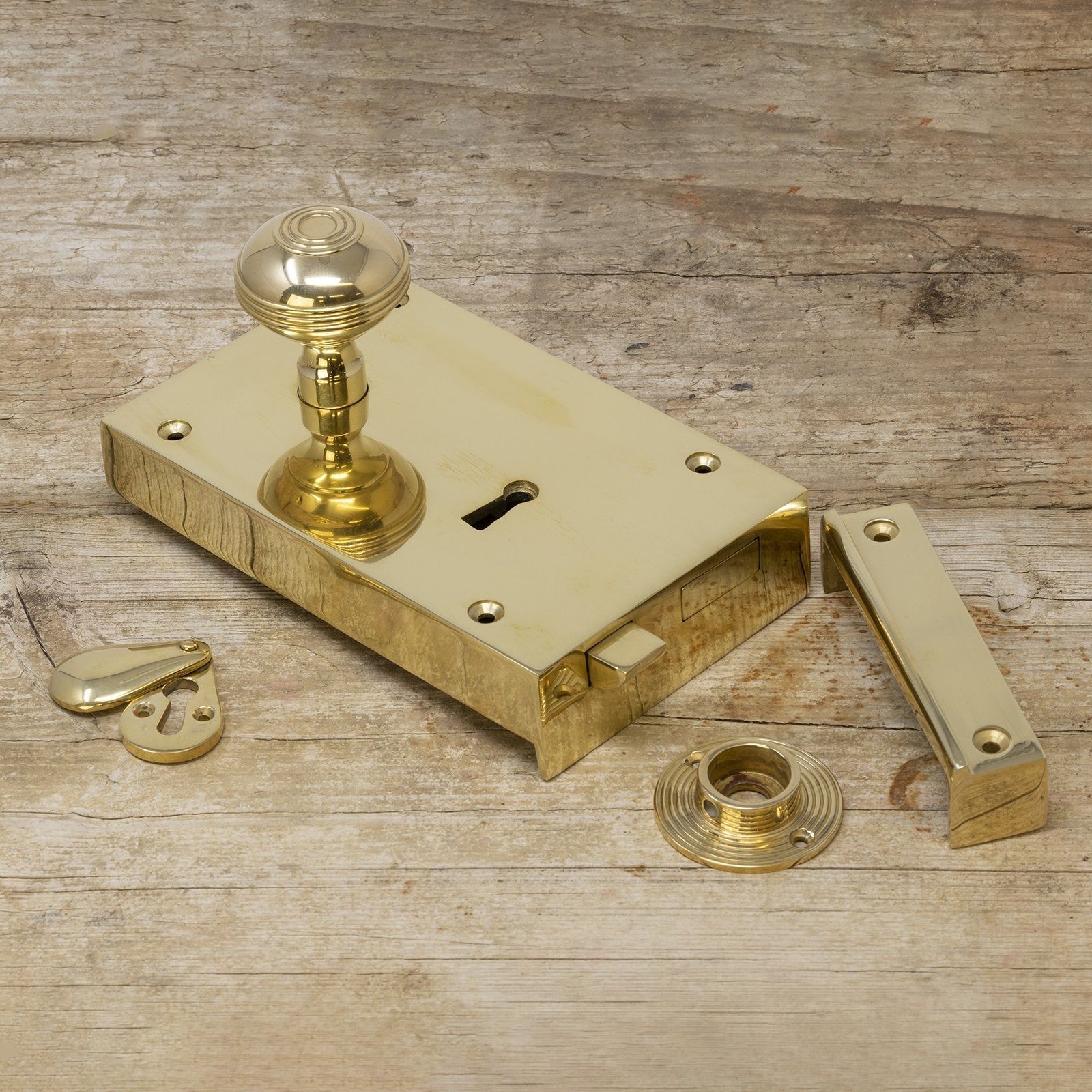 brass rim ock and brass ringed door knob set SHOW