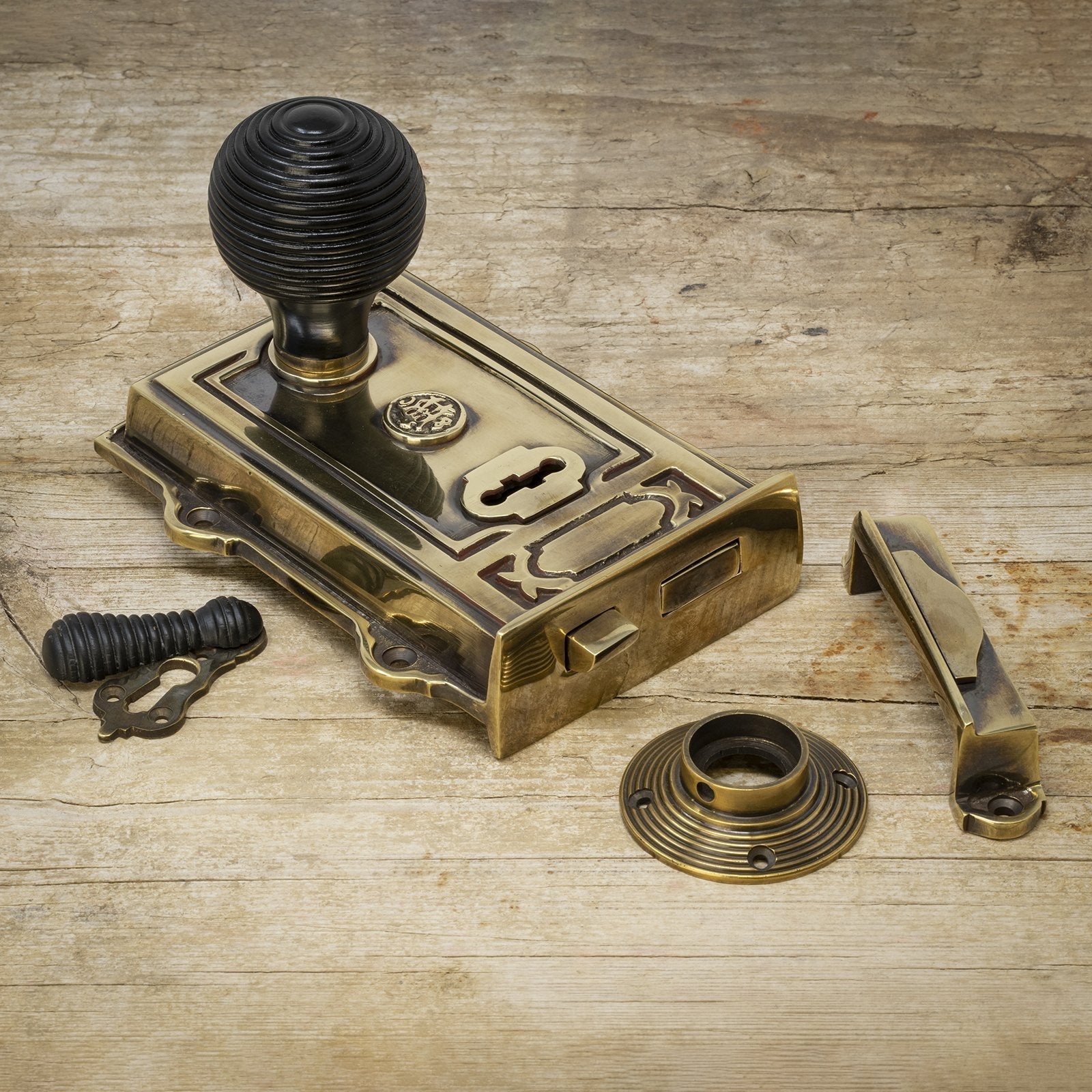 ornate antique brass rim lock & ebonised beehive door knob set SHOW