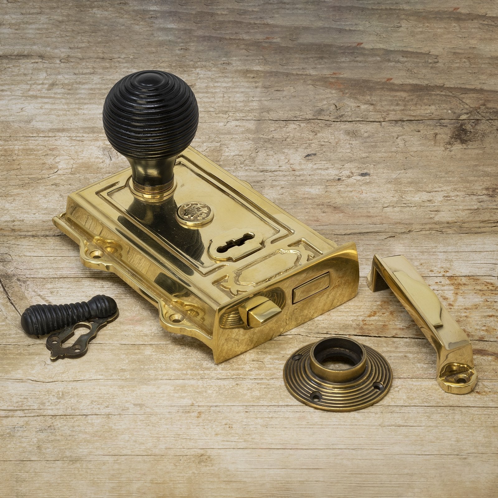 ornate brass rim lock & ebonised beehive door knob set SHOW