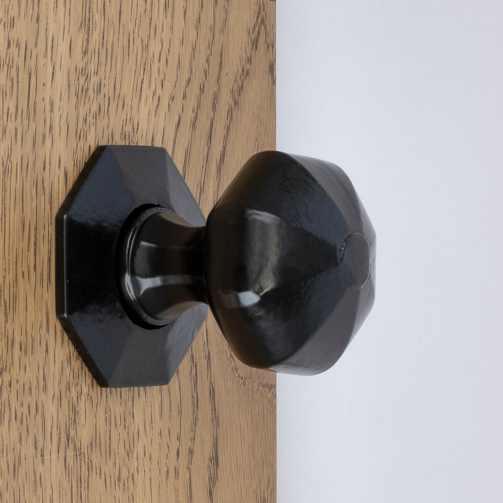 Door with octagonal black door knob SHOW