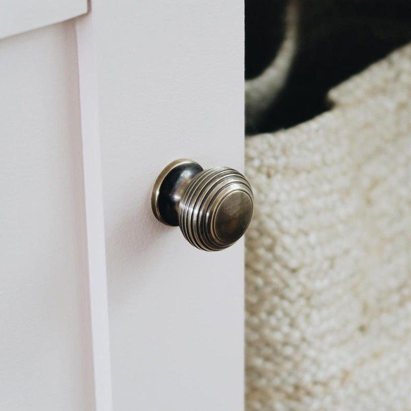 antique brass beehive cabinet knob on cupboard SHOW